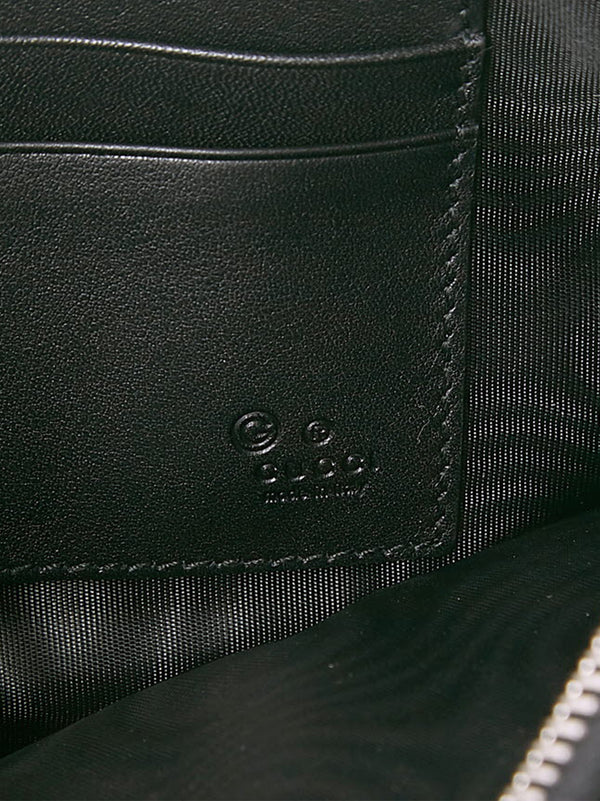 Gucci Borsa a Mano Pouch Nera Uomo Microguccissima Mod. 544477 BMJ1N 1000