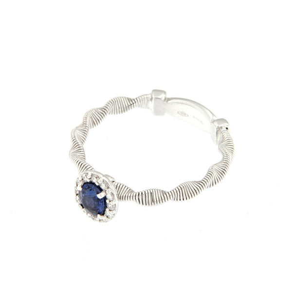 Anello in oro bianco con diamanti e zaffiri blu