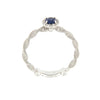 Anello in oro bianco con diamanti e zaffiri blu