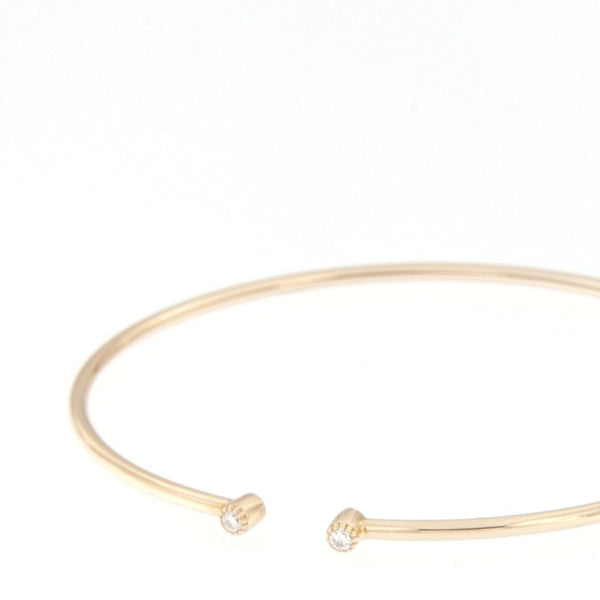 Bracciale flessibile in oro rosa con diamanti