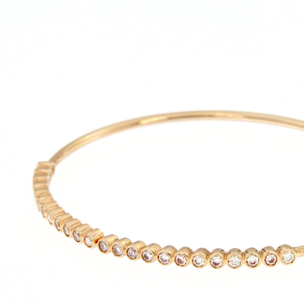 Bracciale flessibile in oro rosa con diamanti
