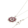 Collana in oro bianco con rubini e diamanti