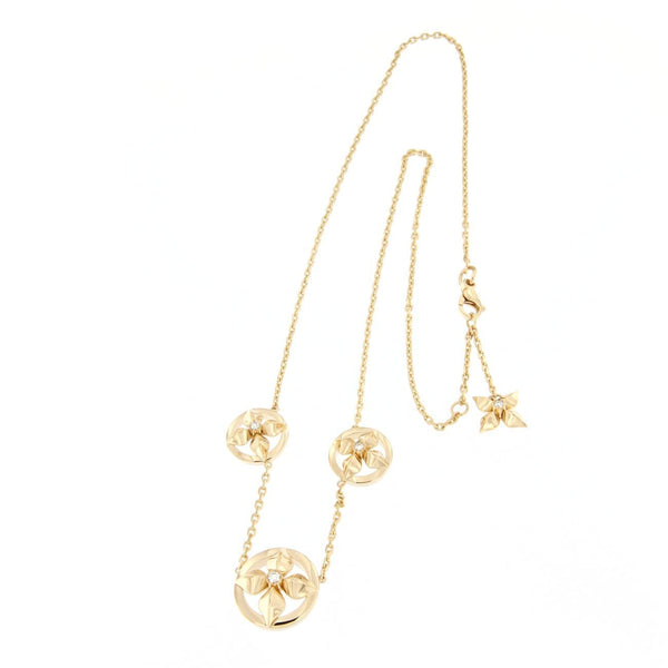 Collana a tre fiori in oro giallo e diamanti